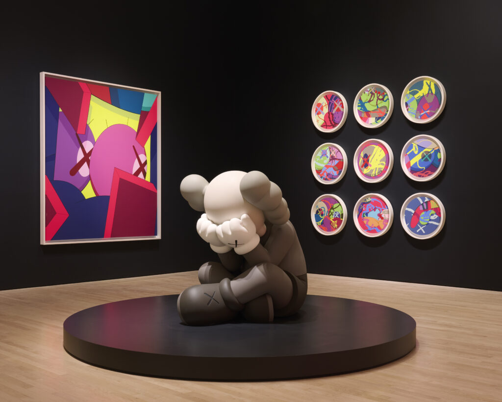 A large-scale KAWS installation on view at SFMOMA, featuring the artist's signature cartoon-inflected figures.